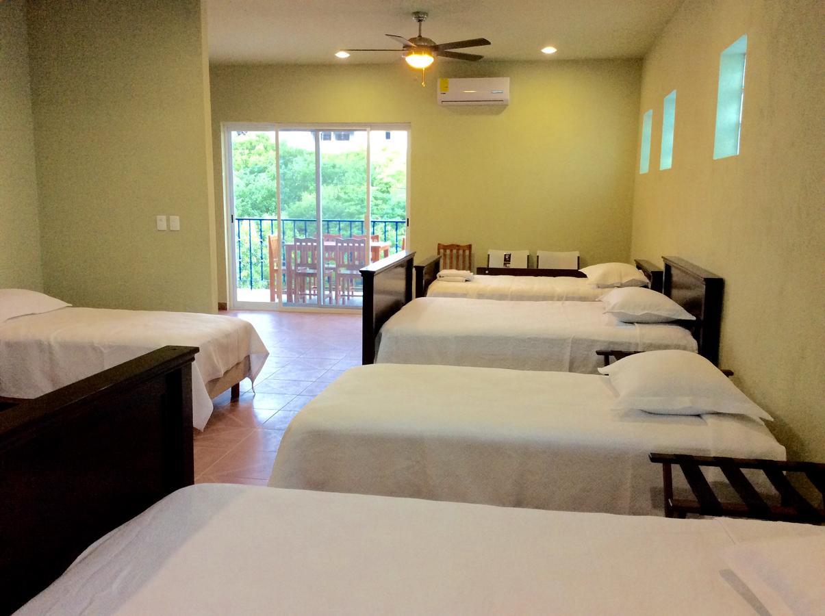 إيسلا موخيريس Casa Paloma Blanca Hostel المظهر الخارجي الصورة